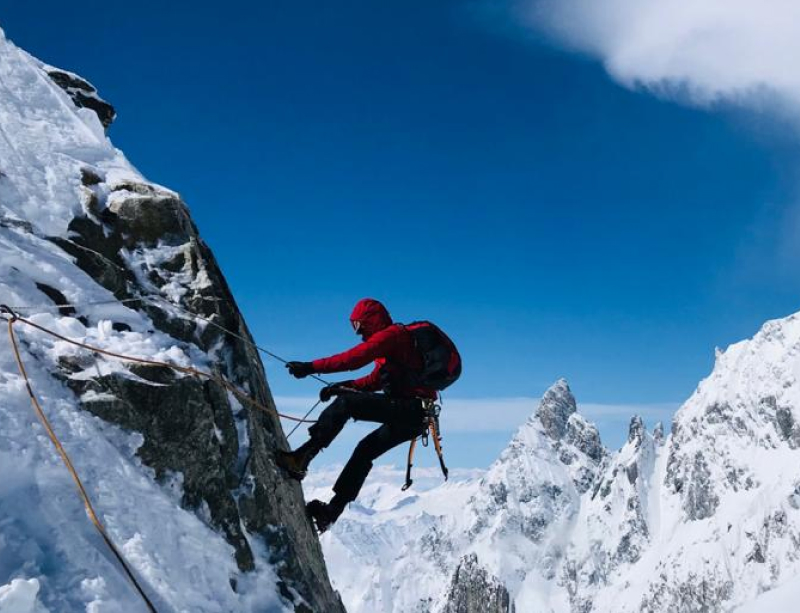 Michel climbing in the snow